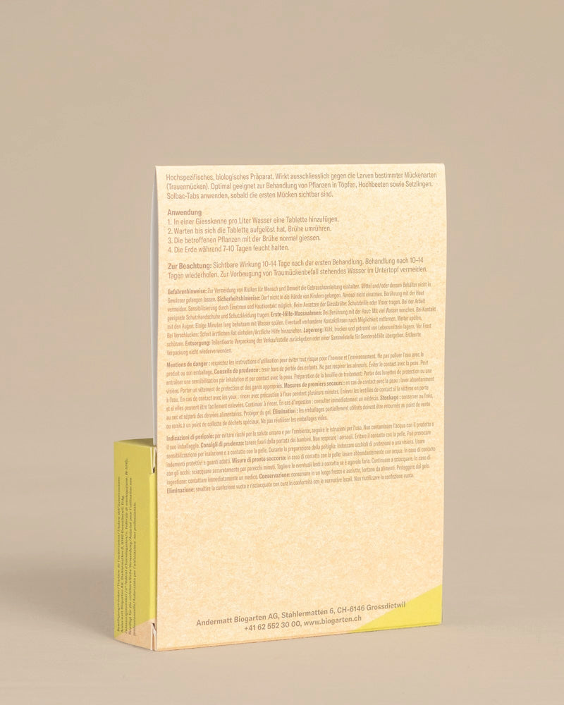 Das Bild zeigt die Rückseite einer gelb-weißen 